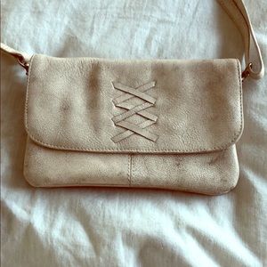 Latico Beige Leather clutch.